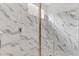 Large walk-in shower with marble tile and built-in seat at 4507 Terrazza Ct, Bradenton, FL 34211