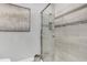 Walk-in shower with glass enclosure and modern tile at 4507 Terrazza Ct, Bradenton, FL 34211
