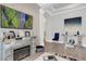 Elegant living room with fireplace and marble accent wall at 4507 Terrazza Ct, Bradenton, FL 34211