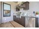 Outdoor kitchen with stainless steel appliances and granite countertops at 4507 Terrazza Ct, Bradenton, FL 34211