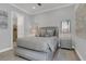 Bright bedroom with a queen-size bed and en-suite bathroom access at 4507 Terrazza Ct, Bradenton, FL 34211
