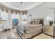 Spacious bedroom with large windows and a sitting area at 4507 Terrazza Ct, Bradenton, FL 34211