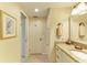Bright bathroom featuring a granite countertop and tiled floors providing a welcoming space at 136 Crescent Dr, Anna Maria, FL 34216