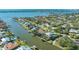 Aerial view of waterfront community with canals and various houses at 1833 Sandalwood Dr, Sarasota, FL 34231