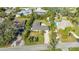 Aerial view of a house with a large yard, located in a residential area at 1833 Sandalwood Dr, Sarasota, FL 34231