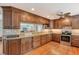 Spacious kitchen with granite countertops and stainless steel appliances at 1833 Sandalwood Dr, Sarasota, FL 34231