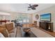 Comfortable living room with hardwood floors and access to a patio at 1833 Sandalwood Dr, Sarasota, FL 34231