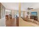 Open living room with hardwood floors and access to a patio at 1833 Sandalwood Dr, Sarasota, FL 34231