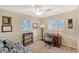 Home office with desk, chair, and ceiling fan at 1833 Sandalwood Dr, Sarasota, FL 34231