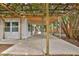 Large covered patio with pergola offering shade and outdoor living space at 2912 Pinecrest Way, Sarasota, FL 34239