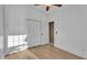 Bright bedroom with double door closet and wood floors at 5125 40Th W St, Bradenton, FL 34210