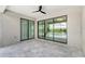 Covered patio with pool and lake view at 4967 Seafoam Trl, Bradenton, FL 34211