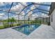 Screened pool and patio offer refreshing escape at 4967 Seafoam Trl, Bradenton, FL 34211