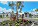 Community clubhouse with circular driveway at 4967 Seafoam Trl, Bradenton, FL 34211