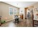 Bright dining area with tile floors and a table for four at 8798 Tuscany Isles Dr, Punta Gorda, FL 33950
