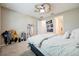 Comfortable bedroom with carpeted floors and ceiling fan at 8798 Tuscany Isles Dr, Punta Gorda, FL 33950