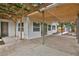 Covered patio and walkway leading to backyard at 2912 Pinecrest Way, Sarasota, FL 34239