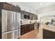 Modern kitchen with stainless steel appliances and granite countertops at 6106 45Th W St, Bradenton, FL 34210
