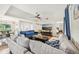 Open concept living area with hardwood floors and ample seating at 6106 45Th W St, Bradenton, FL 34210