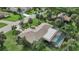 Aerial view showcasing a home with a pool and spacious backyard at 6106 45Th W St, Bradenton, FL 34210
