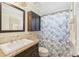 Clean bathroom with shower/tub combo, vanity, and linen storage at 6106 45Th W St, Bradenton, FL 34210