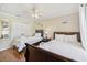 Well-lit bedroom featuring twin and full-size beds with wood frames at 6106 45Th W St, Bradenton, FL 34210