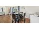 Bright breakfast nook with a small table and four chairs, near sliding doors at 6106 45Th W St, Bradenton, FL 34210