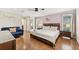 Spacious main bedroom with a king-size bed and en-suite bathroom at 6106 45Th W St, Bradenton, FL 34210