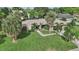 Single-Gathering home with a large backyard and palm trees at 6106 45Th W St, Bradenton, FL 34210