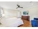 Spacious main bedroom with king bed, dresser, and a sitting area at 6106 45Th W St, Bradenton, FL 34210