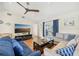 Bright and airy living room with hardwood floors and sectional sofa at 6106 45Th W St, Bradenton, FL 34210