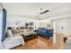 Living room with hardwood floors, comfy seating and open floor plan at 6106 45Th W St, Bradenton, FL 34210