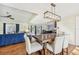 Open concept dining room with a view of the living room and kitchen at 6106 45Th W St, Bradenton, FL 34210