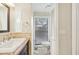 Bright bathroom with single sink, toilet, and window for natural light at 6106 45Th W St, Bradenton, FL 34210