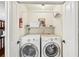 Convenient laundry room with washer and dryer, plus shelving at 6106 45Th W St, Bradenton, FL 34210