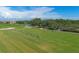 Expansive driving range provides ample space for practicing golf at 7620 Club Ln, Sarasota, FL 34238
