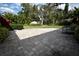 Outdoor patio with brick pavers, perfect for relaxing at 1833 Sandalwood Dr, Sarasota, FL 34231