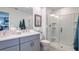 Modern bathroom with double vanity and shower at 8705 Winter Breeze Way, Sarasota, FL 34241