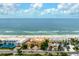 Aerial view of beachfront property with ocean and surrounding buildings at 1900 Gulf N Dr # 1, Bradenton Beach, FL 34217