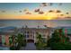 Beachfront property aerial view at sunset at 1900 Gulf N Dr # 1, Bradenton Beach, FL 34217