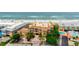 Aerial view of luxurious beachfront condo with ocean views and resort-style amenities at 1900 Gulf N Dr # 1, Bradenton Beach, FL 34217