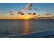 Stunning sunset over the ocean with sandy beach at 1900 Gulf N Dr # 1, Bradenton Beach, FL 34217