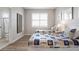 Guest bedroom with two twin beds and a private bathroom at 1900 Gulf N Dr # 1, Bradenton Beach, FL 34217