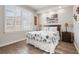 Bedroom with queen bed and private access to bathroom at 1900 Gulf N Dr # 1, Bradenton Beach, FL 34217
