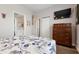 Bedroom with queen bed and shared bathroom at 1900 Gulf N Dr # 1, Bradenton Beach, FL 34217