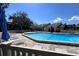 Inviting community pool with ample lounge chairs at 2564 Clubhouse Cir # 204, Sarasota, FL 34232