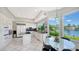 Modern kitchen featuring white cabinets and granite countertops at 495 Mckinley Dr, Sarasota, FL 34236