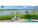 Relaxing pool area with spa and waterfront views at 495 Mckinley Dr, Sarasota, FL 34236