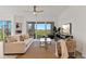 Relaxing living room with neutral tones, comfortable furniture, and scenic views of the golf course at 7390 Divot Loop, Lakewood Ranch, FL 34202