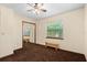 Bedroom featuring closet with mirrored doors, carpet, and window that allows natural light at 7607 9Th Avenue Nw Dr, Bradenton, FL 34209